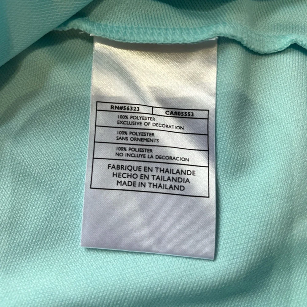Women’s Nike Sphere fit dry pull over V neck short sleeve. Light blue. Medium